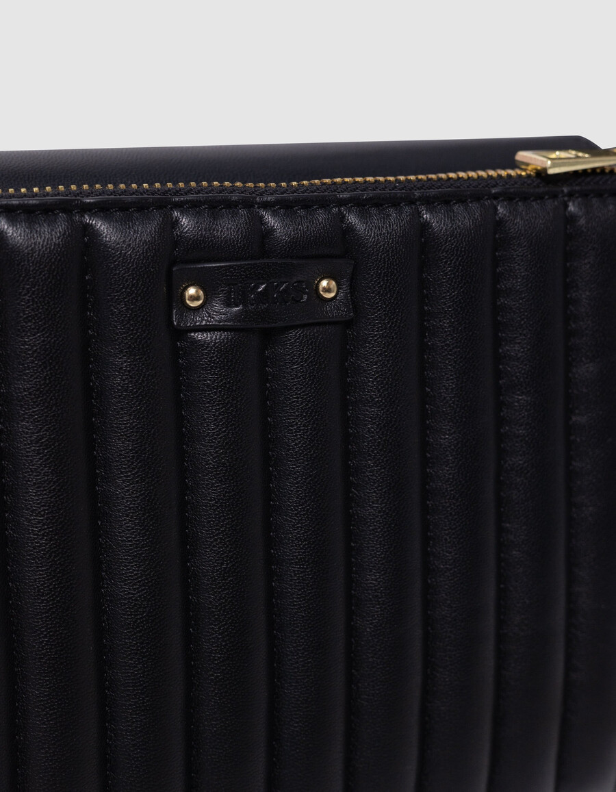 bolso romy 111 de piel negra y dorado metalizado para mujer