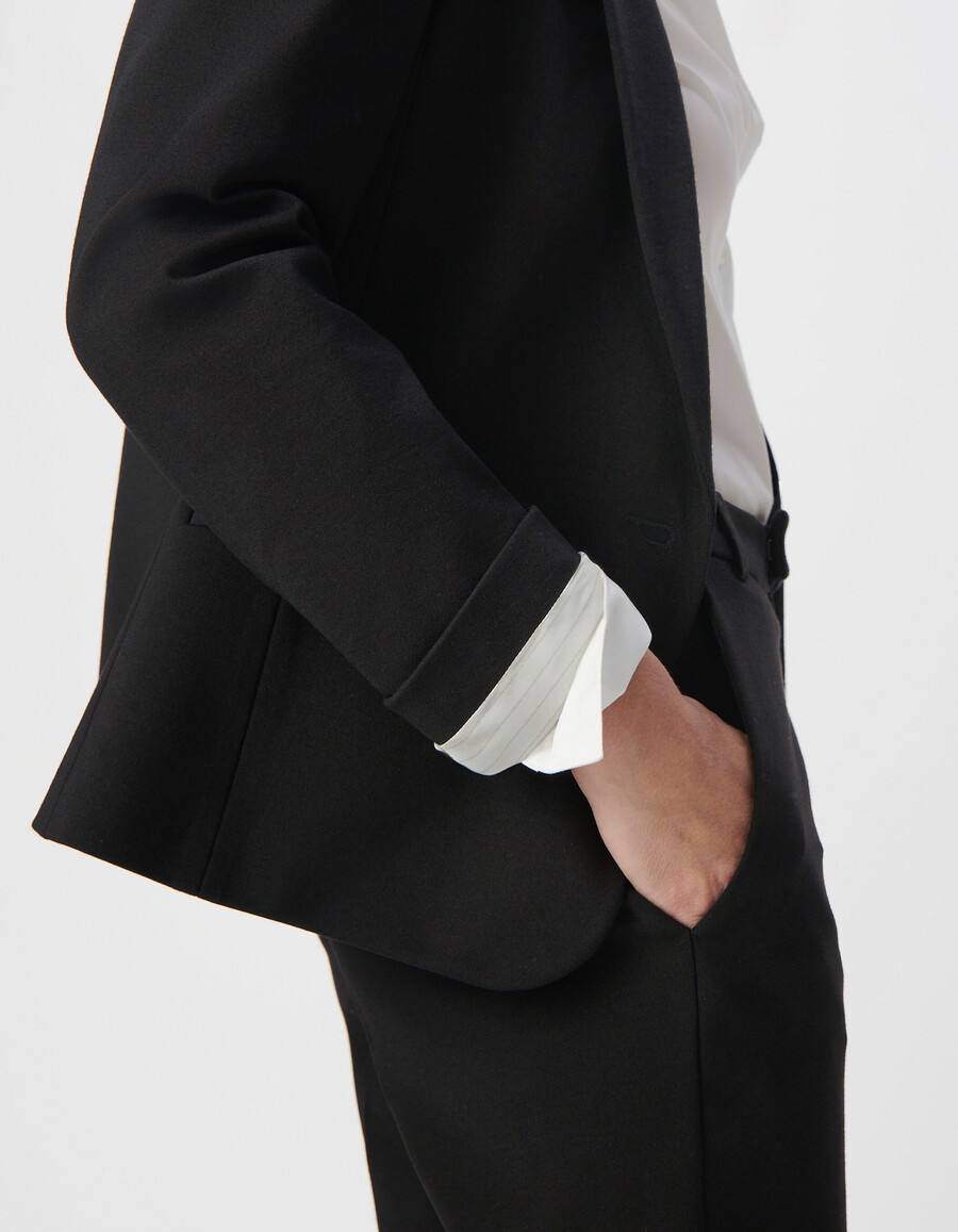 chaqueta de traje ajustada de punto milano negra para mujer