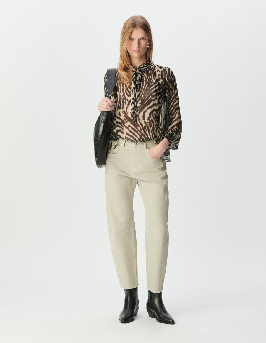 blusa negra con lazo para mujer y estampado de cebra