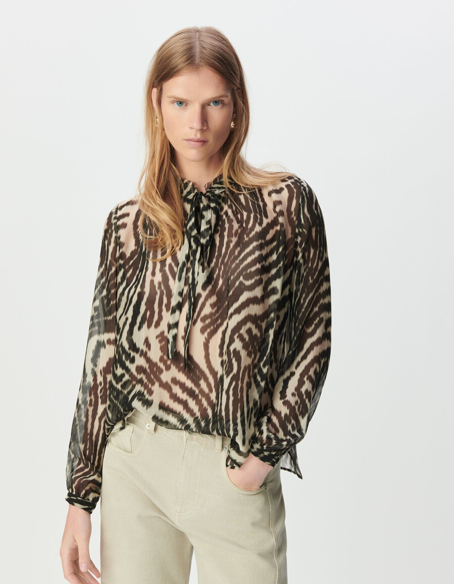 blusa negra con lazo para mujer y estampado de cebra