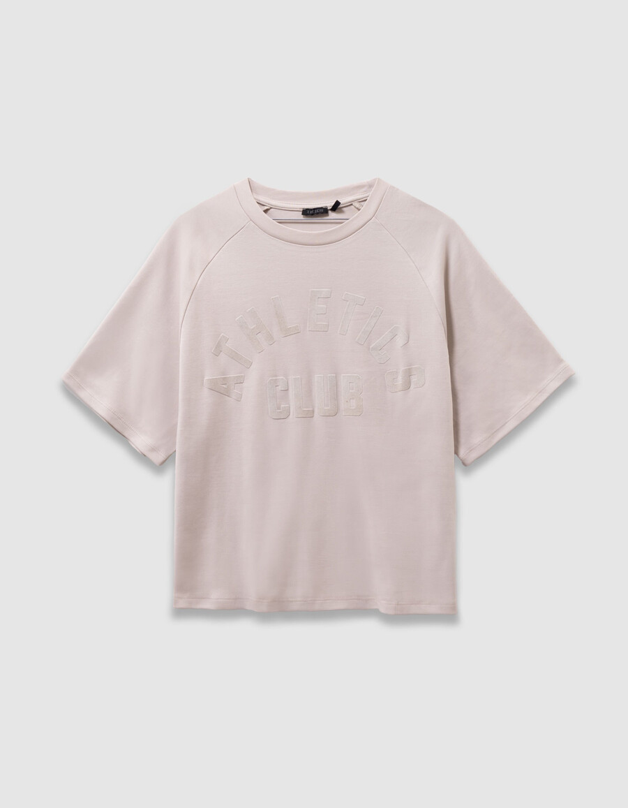 camiseta beige de algodón orgánico para niña con eslogan de terciopelo flocado