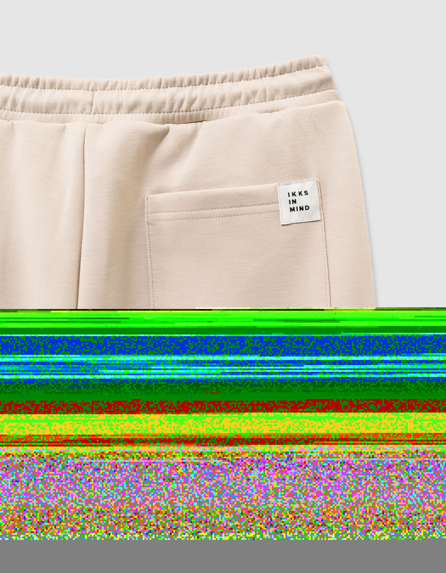 pantalones deportivos cargo beige para niño