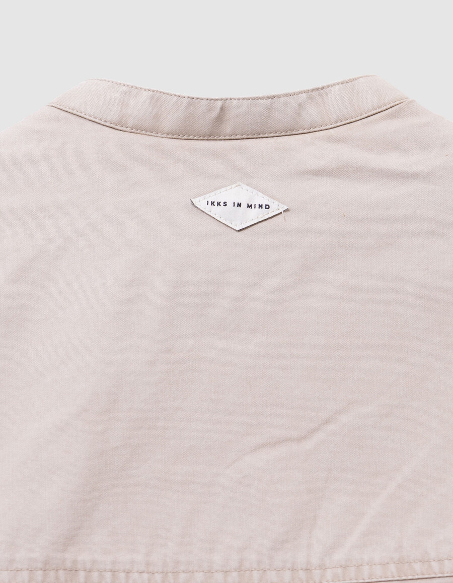 chaqueta de lona beige con forro de piel para niña