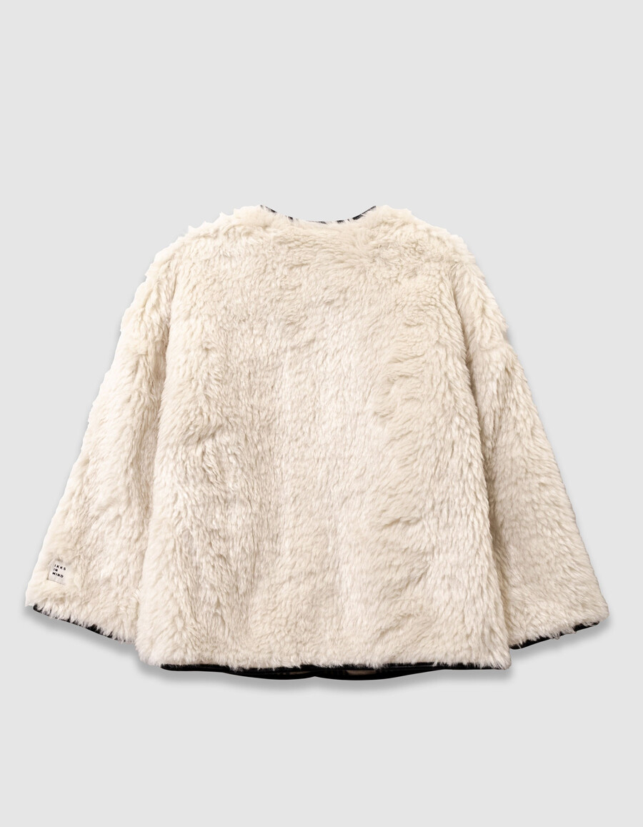 abrigo reversible de cuadros beige y sherpa para niña