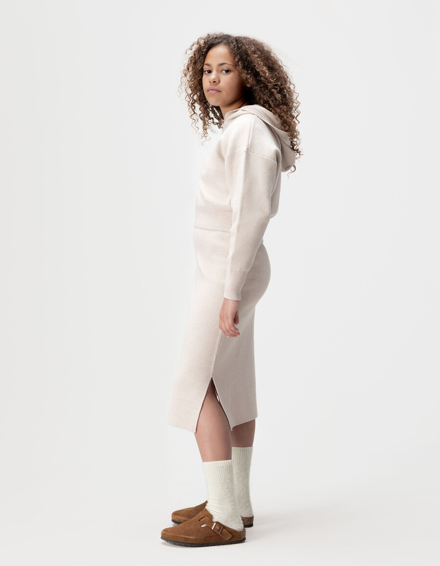 falda midi de punto beige con abertura para niña