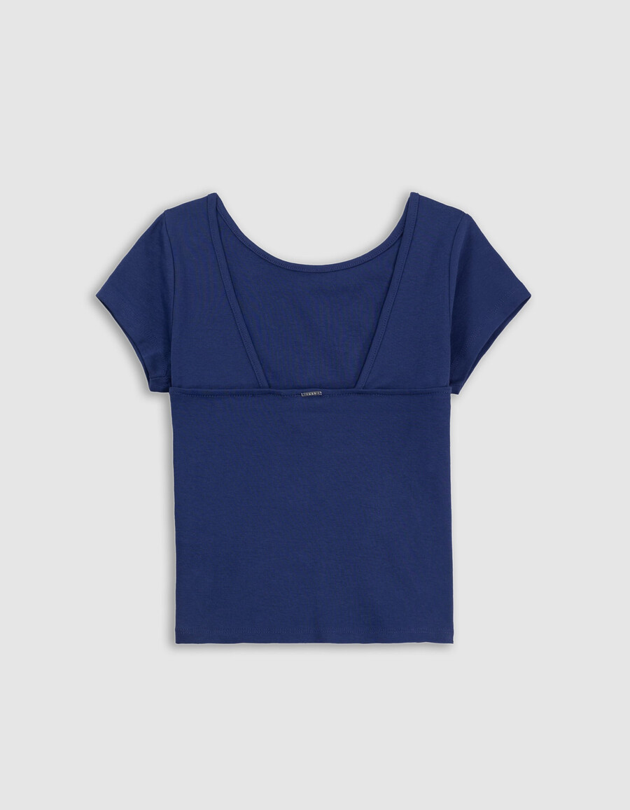 camiseta azul de corte bajo para niña