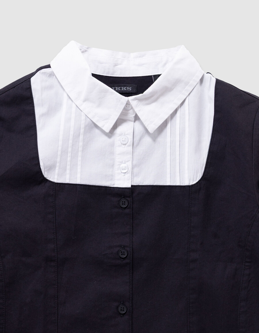 camisa negra con estampado trampantojo para niña con parte delantera blanca