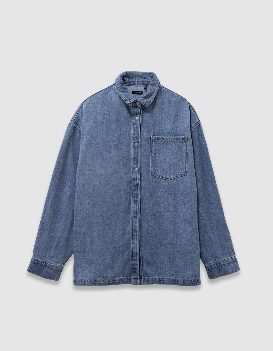 camisa vaquera azul oversize para niña