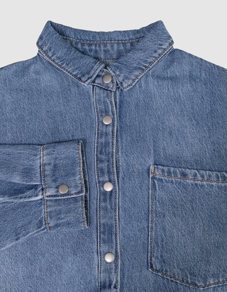 camisa vaquera azul oversize para niña