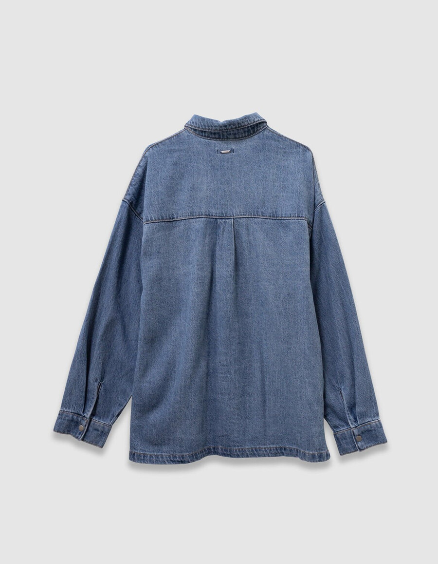 camisa vaquera azul oversize para niña