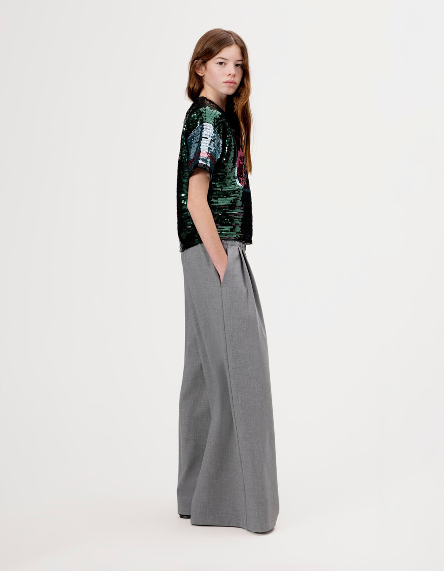 pantalones anchos grises con pliegues planos para niña