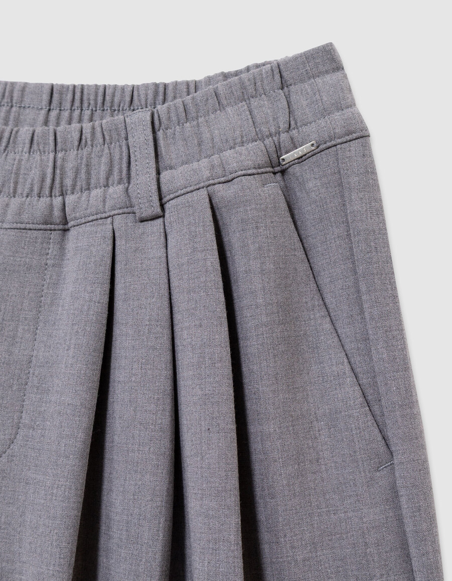 pantalones anchos grises con pliegues planos para niña