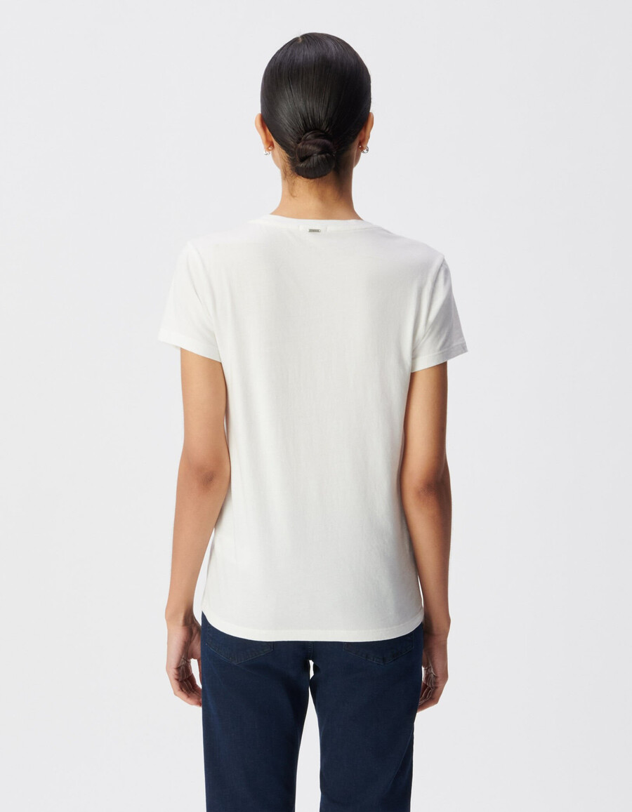 camiseta blanca de cuello en v de algodón orgánico con calavera visual para mujer