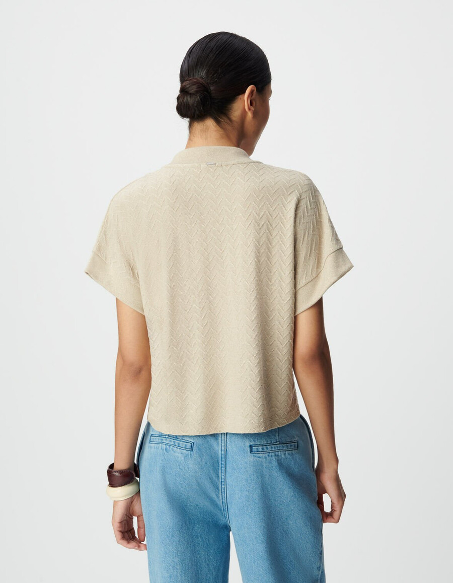 camiseta de manga corta de punto calado de lúrex beige para mujer
