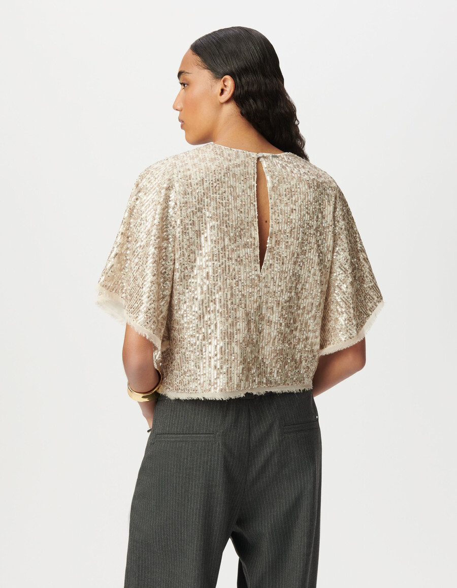 top beige de mujer con lentejuelas doradas y mangas mariposa