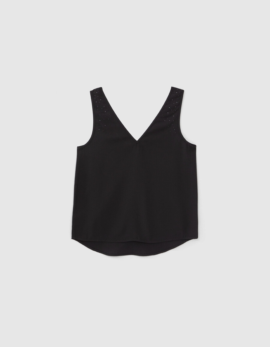 camiseta negra reversible sin mangas para mujer con tachuelas