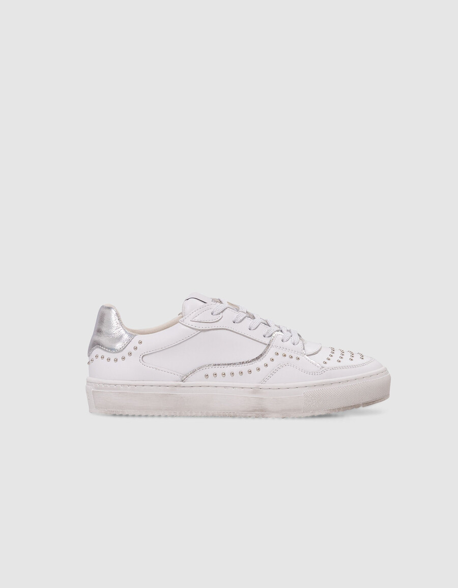 zapatillas de piel blanca con cordones plateados para mujer