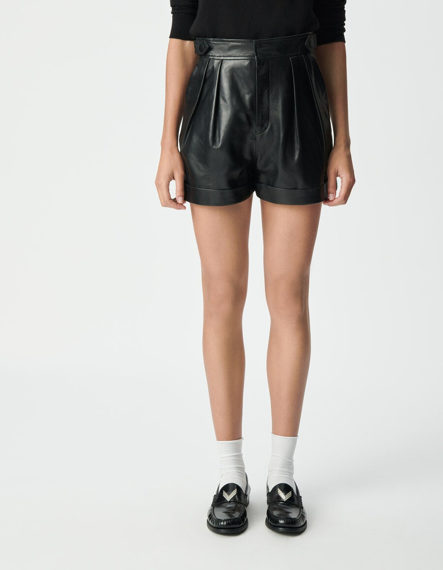 pantalones cortos de cuero negro para mujer con dobladillo